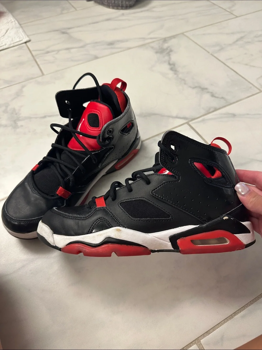Jordan youth size 6y Black and Red High-Top Sneakers